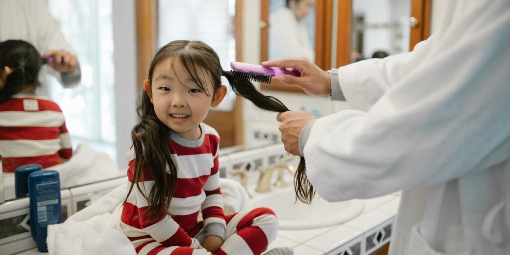 little girl with head lice